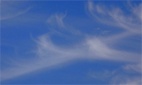 Two cirrus clouds shake hands